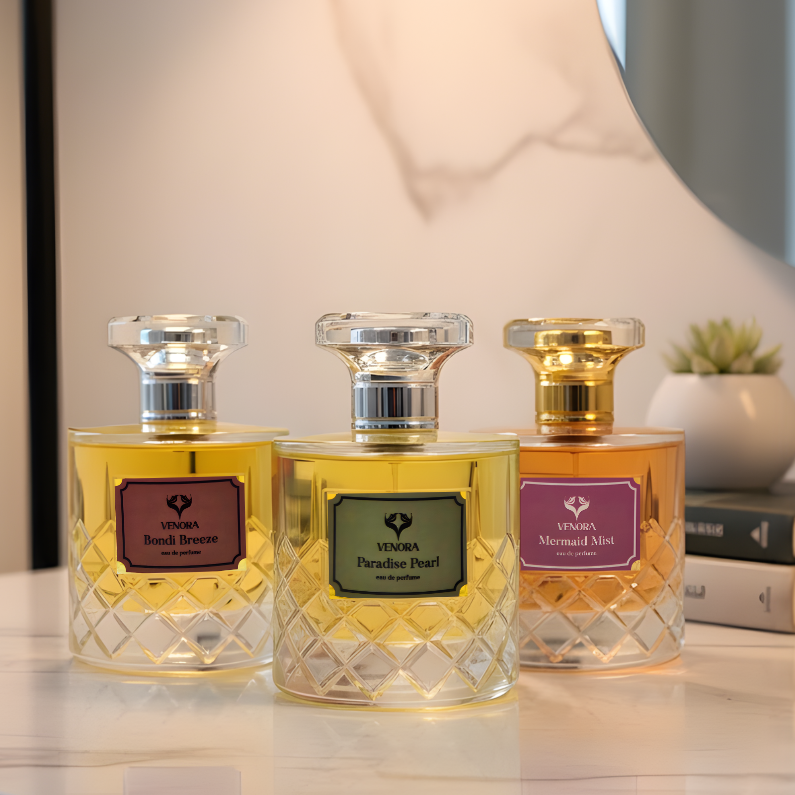 Bold & Addictive perfume trio displayed on a modern vanity or dresser with soft ambient lighting, minimal decor, and clean premium aesthetic.