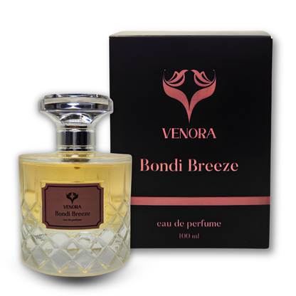 Close-up of Bondi Breeze perfume bottle showing glass texture and label details in soft masculine lighting
