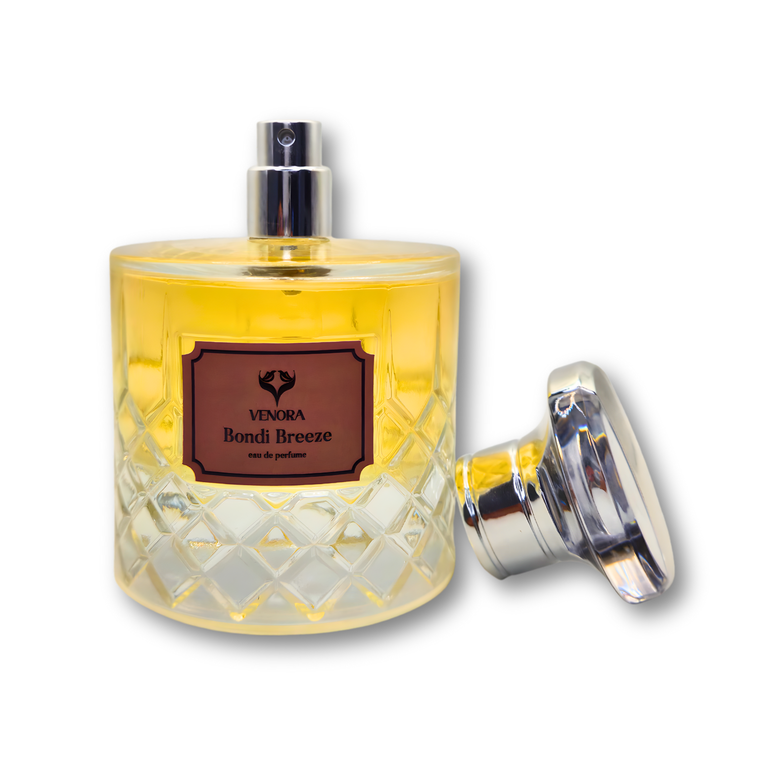 Bondi Breeze perfume displayed with the cap on and cap off to reveal the spray nozzle in a luxury product shot.