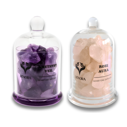 Crystal Calm Gift Set by Venora featuring Amethyst Veil and Rose Aura gemstone diffusers displayed in clear glass vessels on a white background.