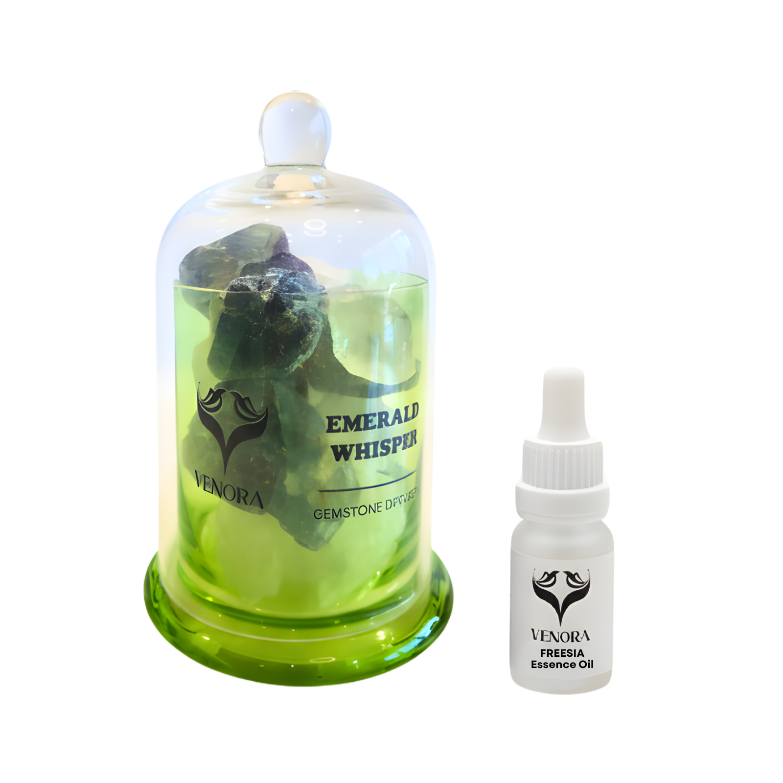 Emerald Whisper crystal diffuser displayed with its freesia essence oil bottle beside it in a luxury aromatherapy ritual setup.