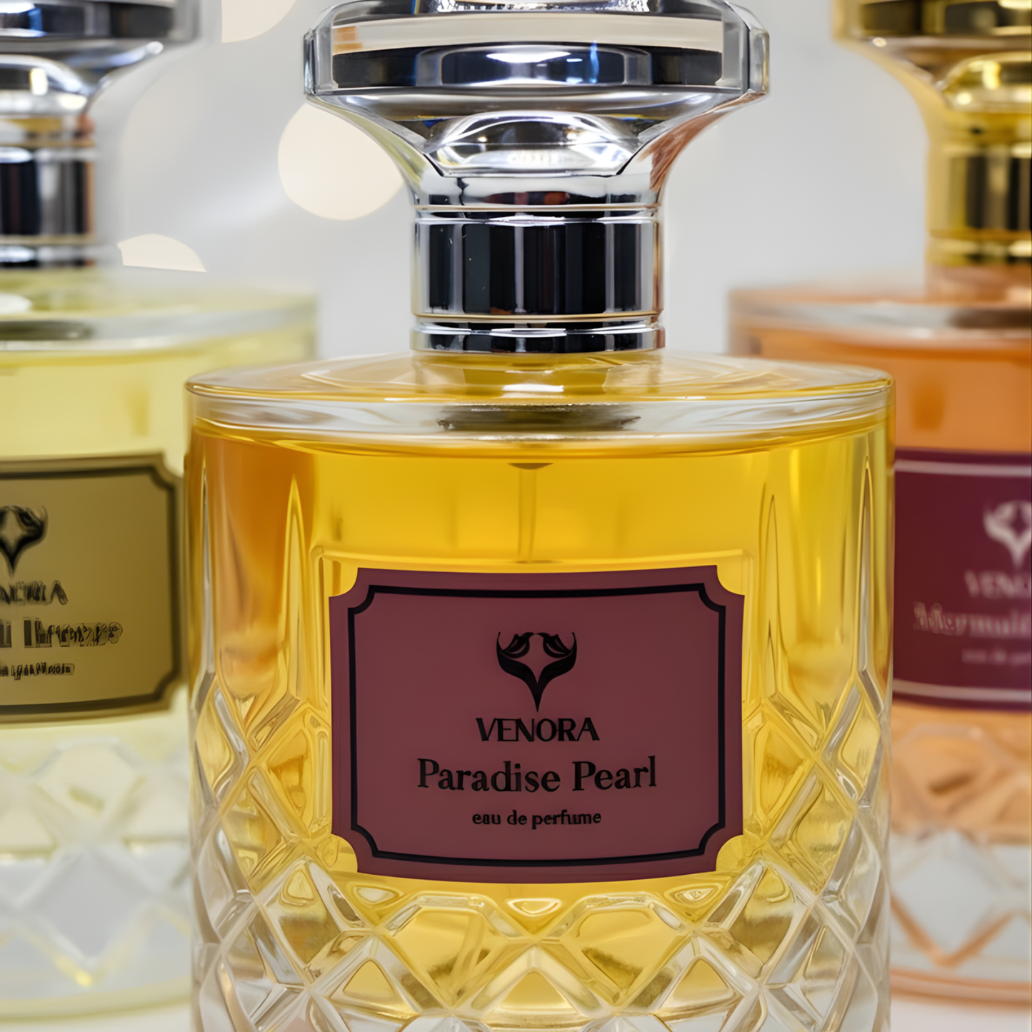 Macro close-up of perfume bottles showing label texture, glass reflections, and cap detailing for Mermaid Mist, Paradise Pearl, and Bondi Breeze. Luxury lighting, shallow depth of field.