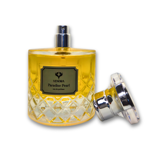 Paradise Pearl perfume shown with cap on and cap off to reveal the spray nozzle, luxury product photography.