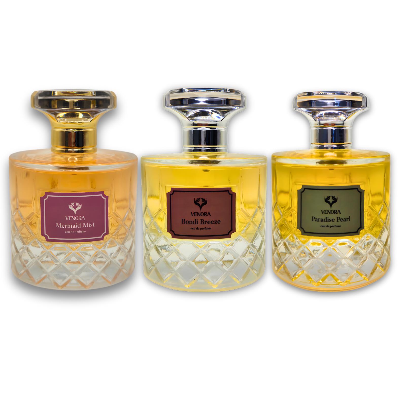 Three perfumes styled together with contrasting tones: feminine warm lighting for Mermaid Mist, dark moody lighting for Paradise Pearl, and cool fresh tones for Bondi Breeze. Cinematic fragrance photography.